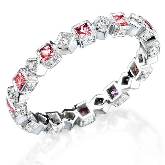 Mill-Grained, Bezel Set Princess Cut Pink Sappires and Micro Pave' Round Brilliant Cut Diamonds accented by hand engraved sides