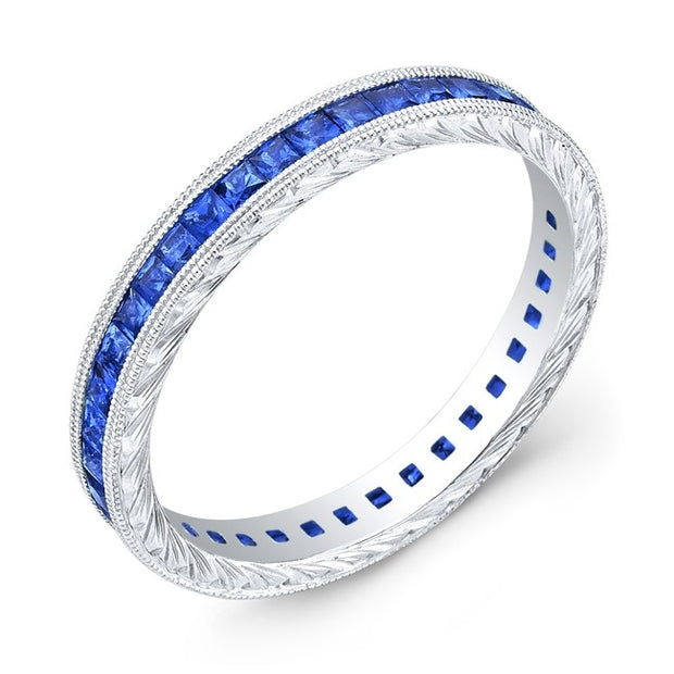 Hand Engraved Gold Ring set with Princess Cut Blue Sapphires