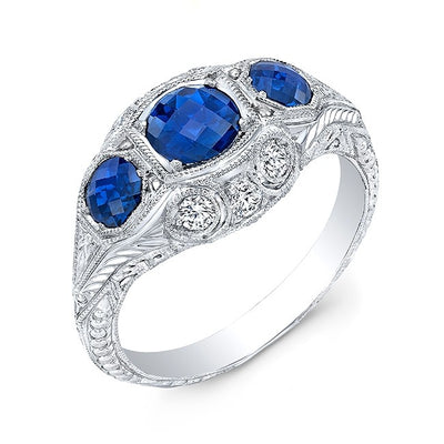 GORDON CLARK- Antique Inspired three stone Blue Sapphire Ring. Mill Graining around the Diamonds and sides.