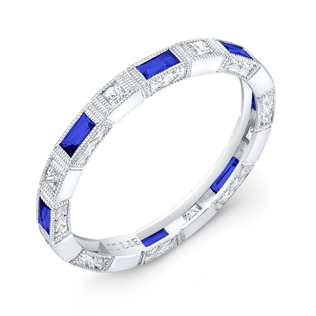 Bezel Set Baguette Blue Sapphires and Princess Cut Diamonds surrounded by mill-Graining and Hand Engraving.