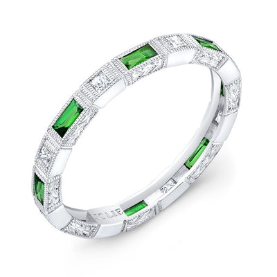 Bezel Set Baguette Tsavorite's  and Princess Cut Diamonds surrounded by mill-Graining and Hand Engraving.