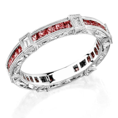 Art Nuevo: Exquisitely Hand Carved Masterpiece set with Custom Cut Princess rubies and Baguette Cut Diamonds.