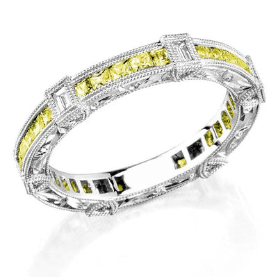 Art Nuevo: Exquisitely Hand Carved Masterpiece set with Custom Cut Princess Yellow Sapphires and Baguette Cut Diamonds.